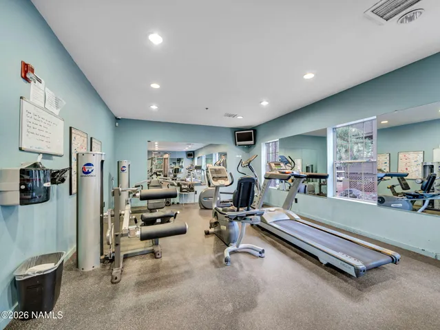 a view of a living room and a dining room