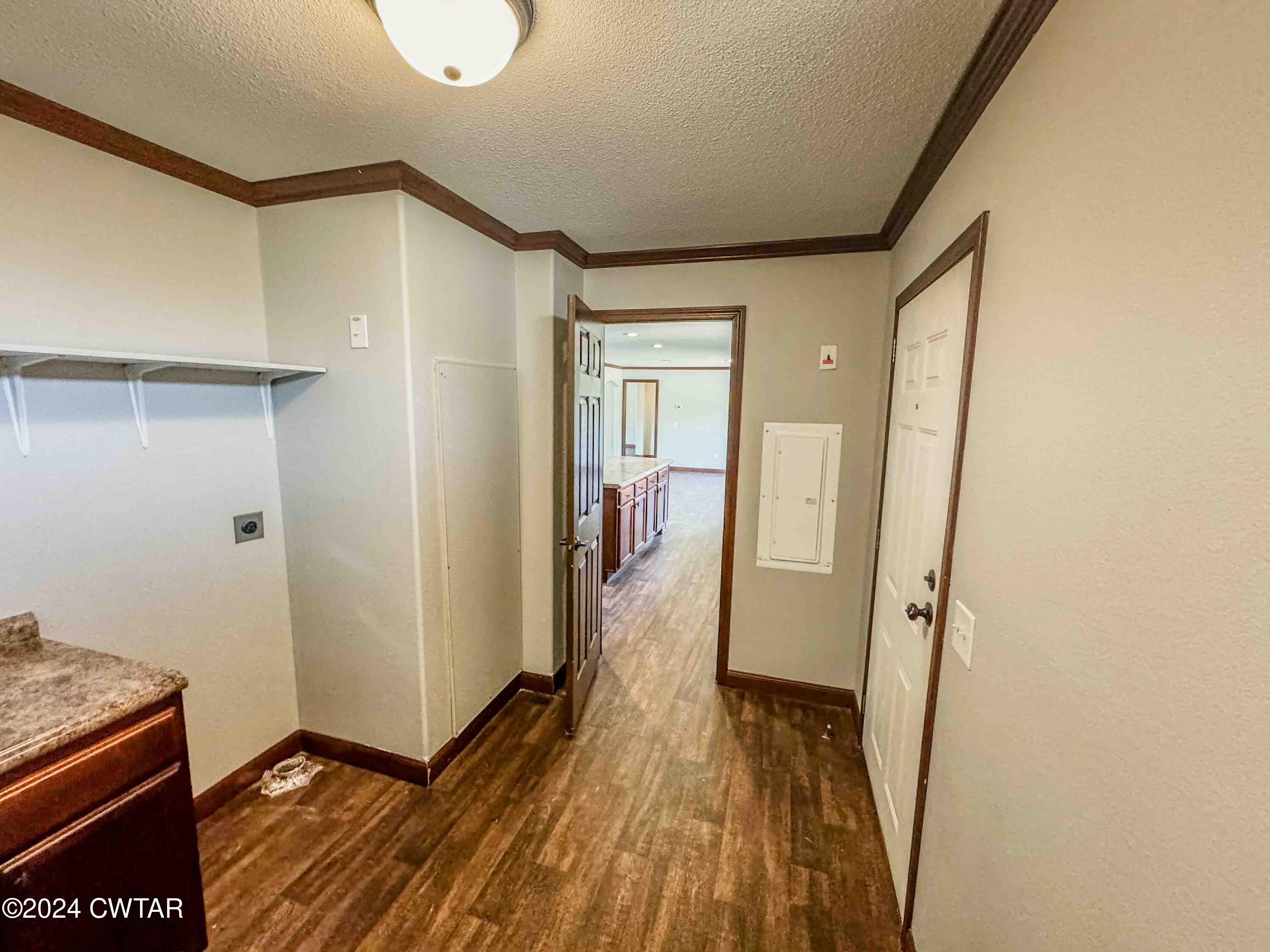 3345 Buchanan Road Buchanan, TN 38222 - Photo 11 of 40 a view of a hallway with wooden floor and staircase