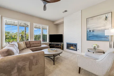 a kitchen with stainless steel appliances granite countertop a stove top oven and refrigerator