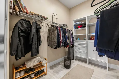 a view of swimming pool with outdoor seating and a patio