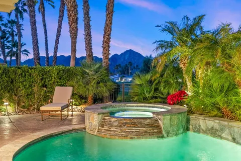 front view of a house with a garden