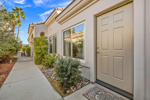 a front view of a house with a porch