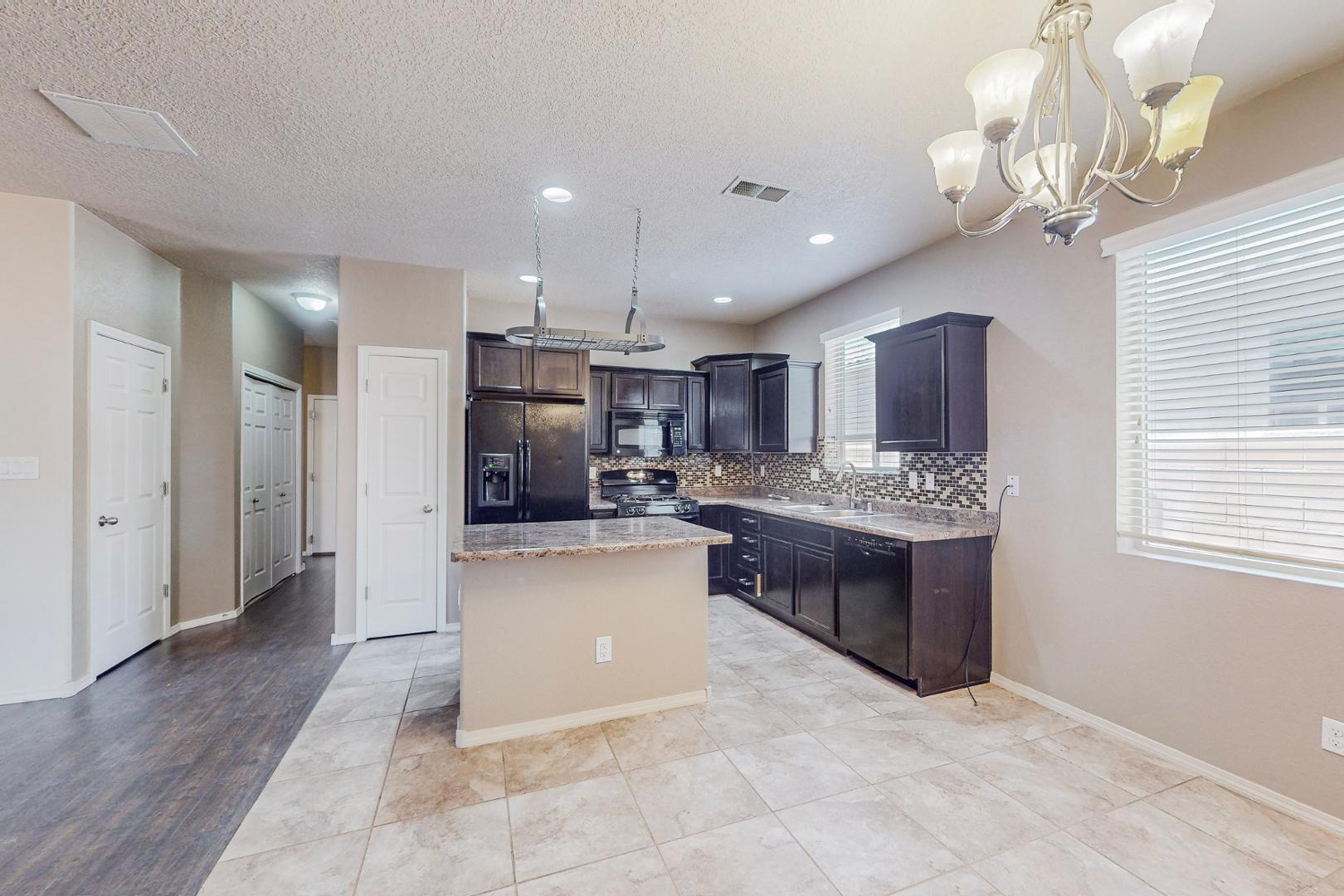8323 Mock Heather Road Northwest Albuquerque, NM 87120 - Photo 5 of 39 Gallery Image 5