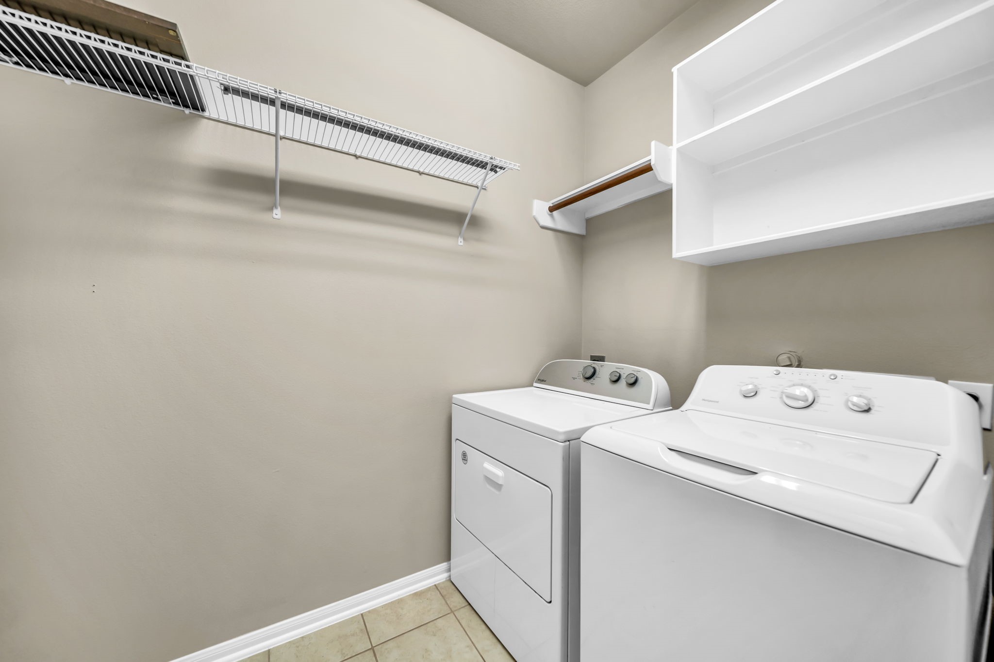 2614 Winding Creek Way Conroe, TX 77385 - Photo 18 of 23 a utility room with dryer and washer