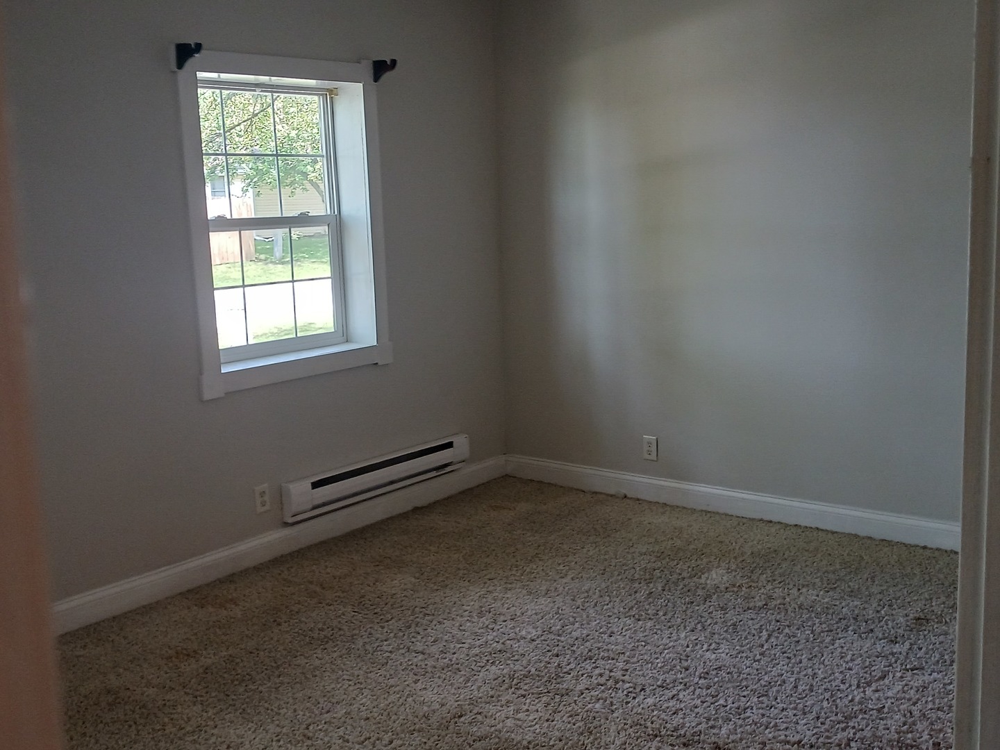 9 Southview Drive Sidney, IL 61877 - Photo 14 of 21 an empty room with a window