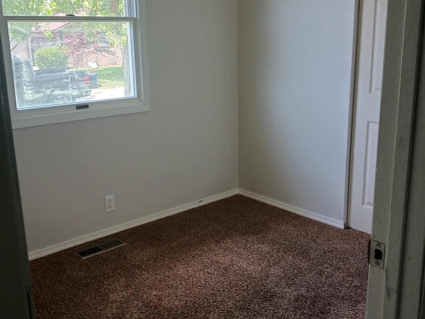 9 Southview Drive Sidney, IL 61877 - Photo 16 of 21 a room that has a window in it