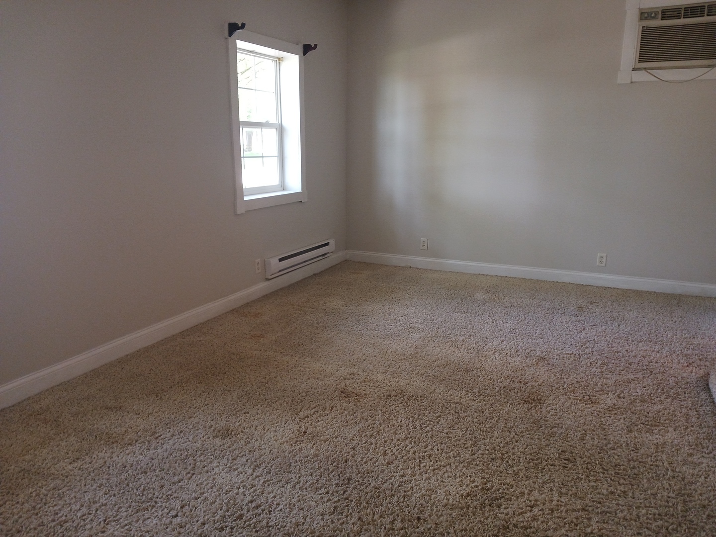 9 Southview Drive Sidney, IL 61877 - Photo 9 of 21 an empty room with a window