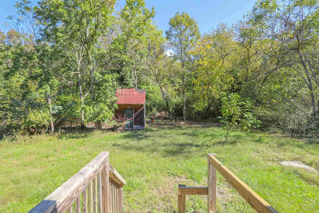a balcony with a yard