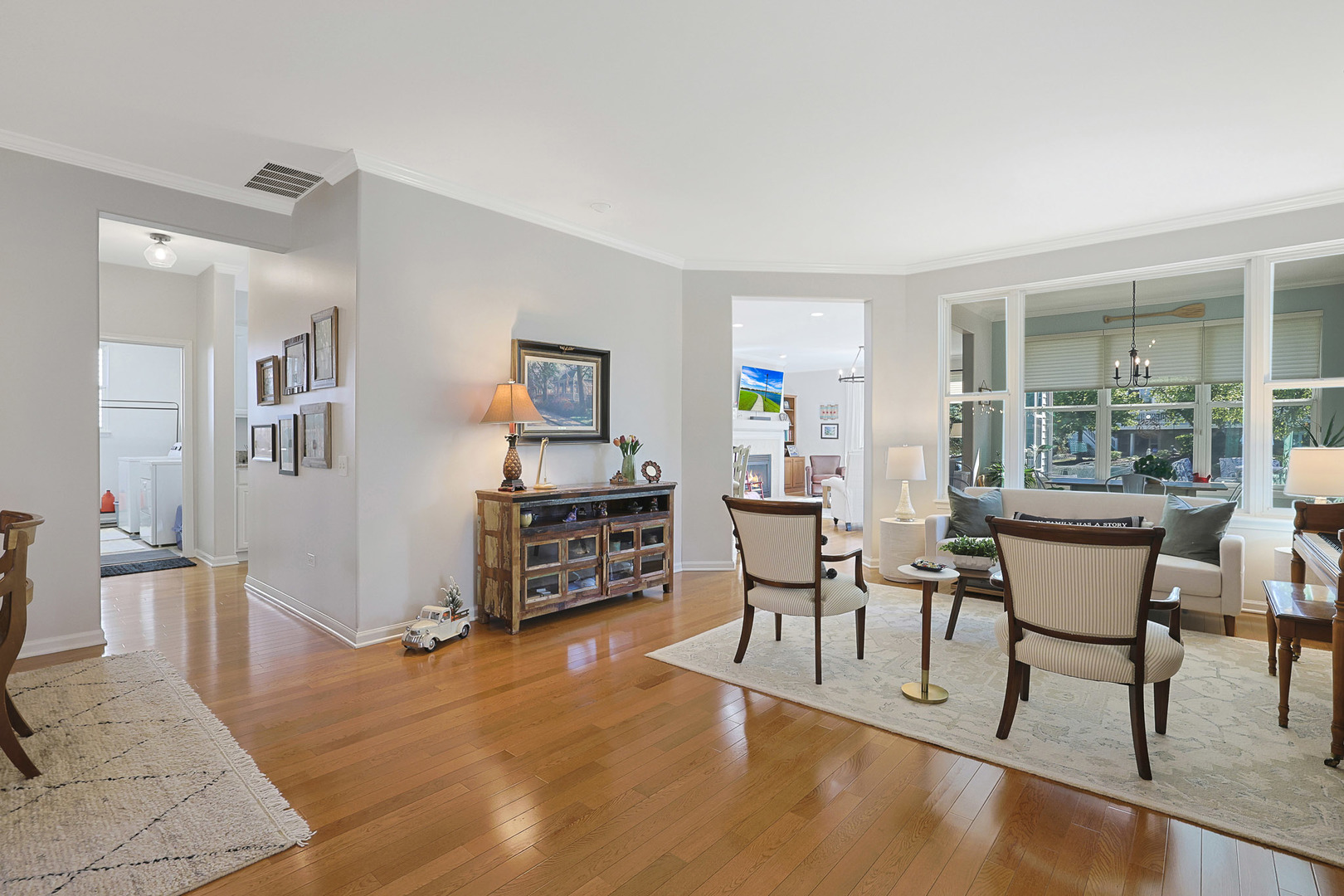 12961 West Bull Ridge Drive Huntley, IL 60142 - Photo 13 of 35 a dining room with furniture and wooden floor