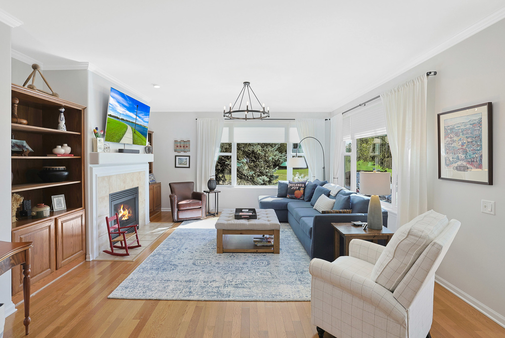 12961 West Bull Ridge Drive Huntley, IL 60142 - Photo 17 of 35 a living room with fireplace furniture and a window