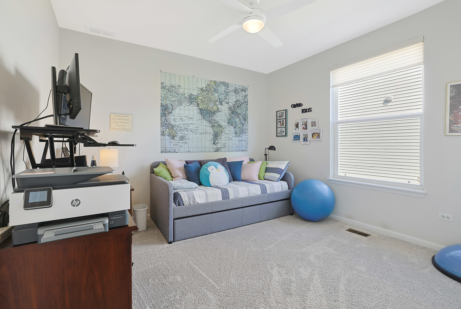 12961 West Bull Ridge Drive Huntley, IL 60142 - Photo 31 of 35 a living room with furniture a flat screen tv and a window