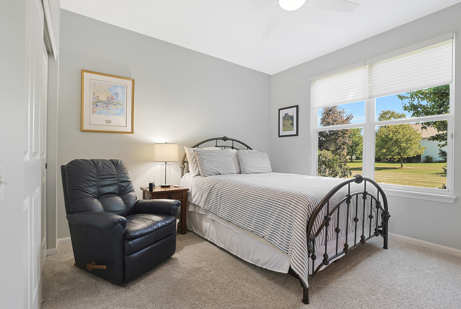 12961 West Bull Ridge Drive Huntley, IL 60142 - Photo 32 of 35 a bed sitting in a bedroom next to a window