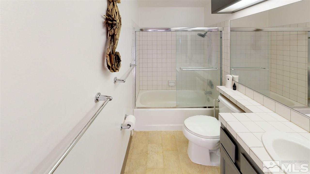 285 Gooseberry Drive Reno, NV 89523 - Photo 15 of 24 a bathroom with a toilet and a shower