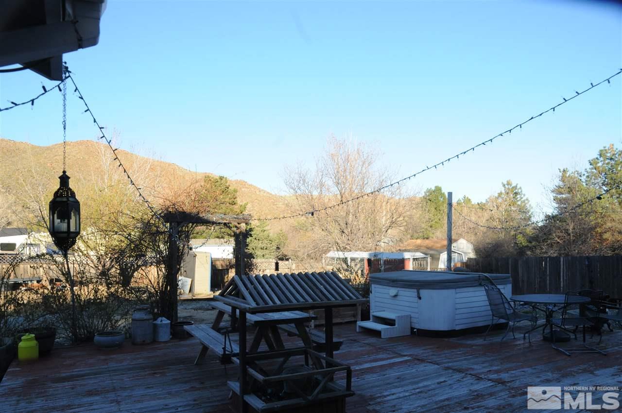 285 Gooseberry Drive Reno, NV 89523 - Photo 17 of 24 a view of balcony with wooden floor and outdoor seating