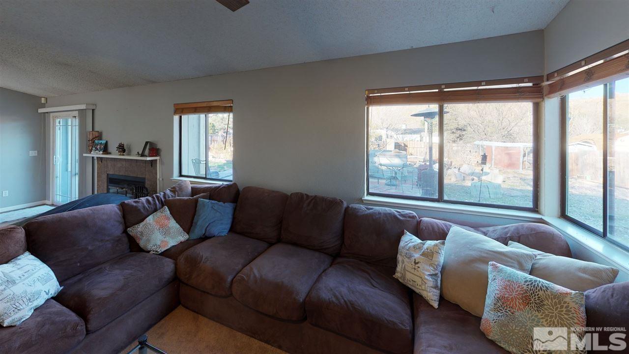 285 Gooseberry Drive Reno, NV 89523 - Photo 8 of 24 a living room with furniture and a large window