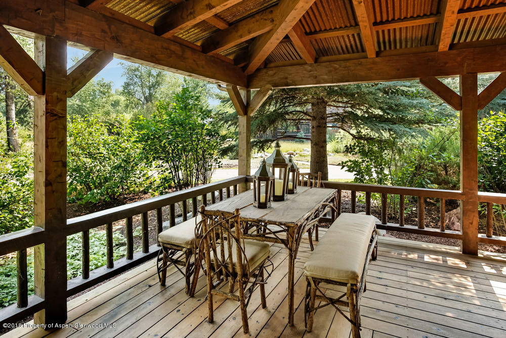 27 Altamira Ranch Road Basalt, CO 81621 - Photo 13 of 22 a view of a chairs and table in the balcony