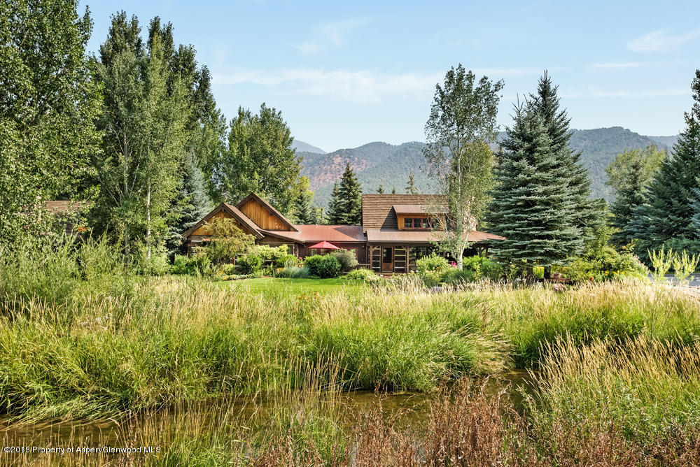 27 Altamira Ranch Road Basalt, CO 81621 - Photo 20 of 22 a aerial view of a house with a yard and lake view