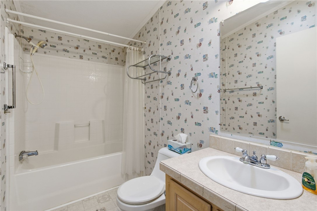 4619 North Lookout Canyon Road Kingman, AZ 86401 - Photo 26 of 50 a bathroom with a sink toilet and shower