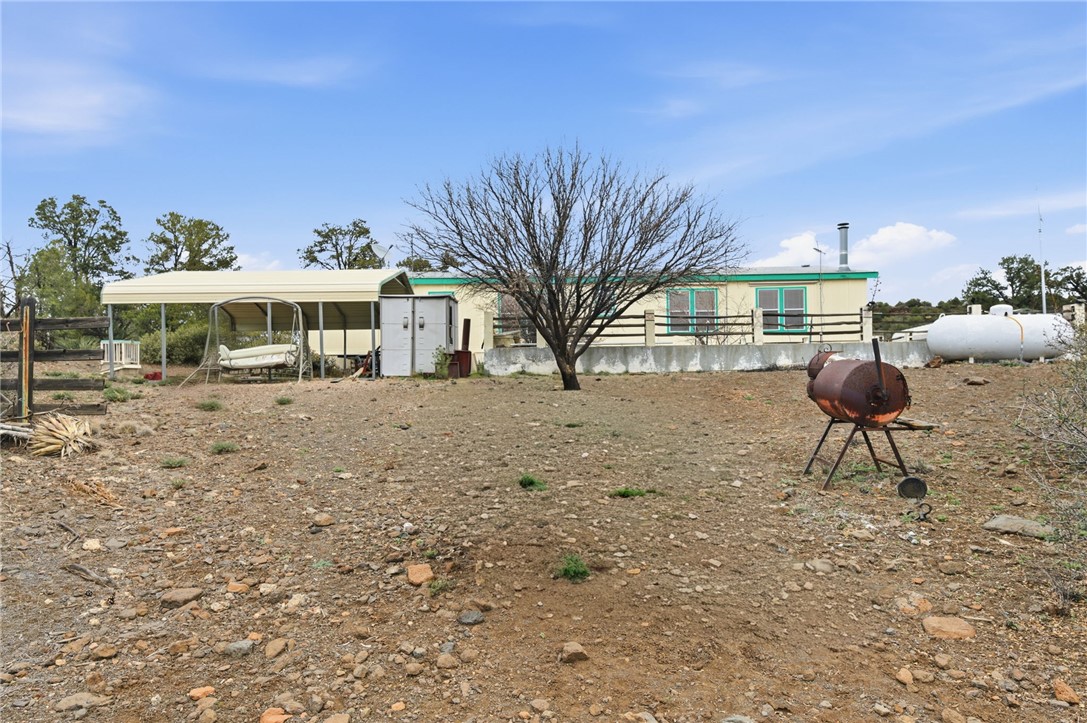 4619 North Lookout Canyon Road Kingman, AZ 86401 - Photo 35 of 50 a view of a house with a yard