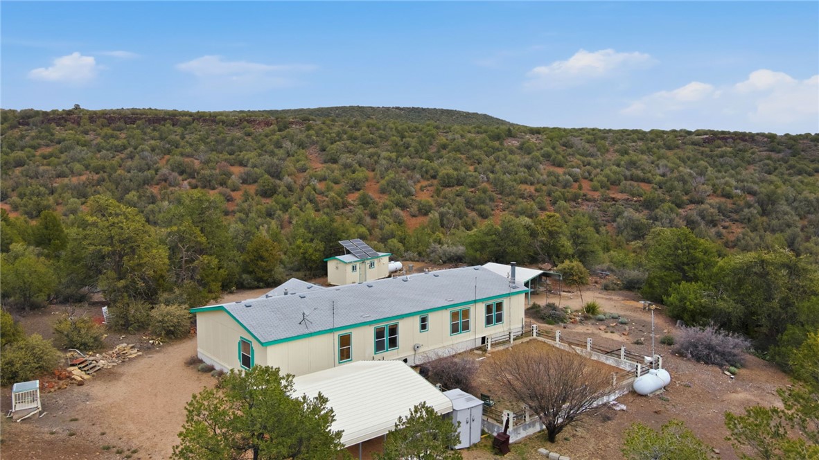 4619 North Lookout Canyon Road Kingman, AZ 86401 - Photo 42 of 50 a view of a house with a yard
