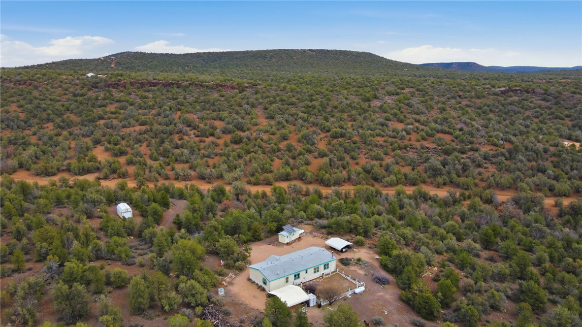4619 North Lookout Canyon Road Kingman, AZ 86401 - Photo 50 of 50 an aerial view of residential houses with outdoor space and trees