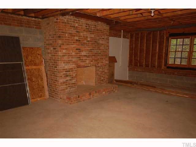 602 Neodak Road Apex, NC 27523 - Photo 11 of 12 This photo is only a small section of the framed and plumbed basement ready for future expansion.