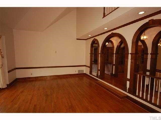 602 Neodak Road Apex, NC 27523 - Photo 5 of 12 WOW! The raised archway accents the living room and family room
