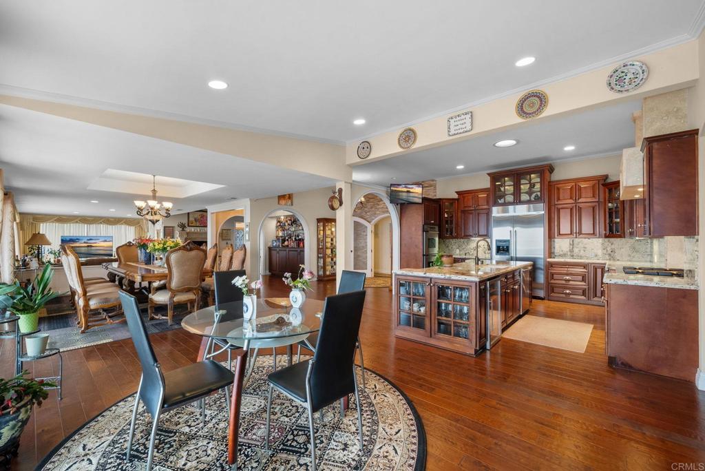 10310 Fuerte Drive La Mesa, CA 91941 - Photo 25 of 75 a view of a dining area with furniture window and wooden floor