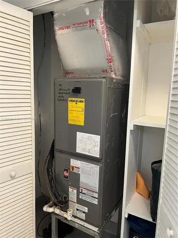 a bathroom with a toilet and shower