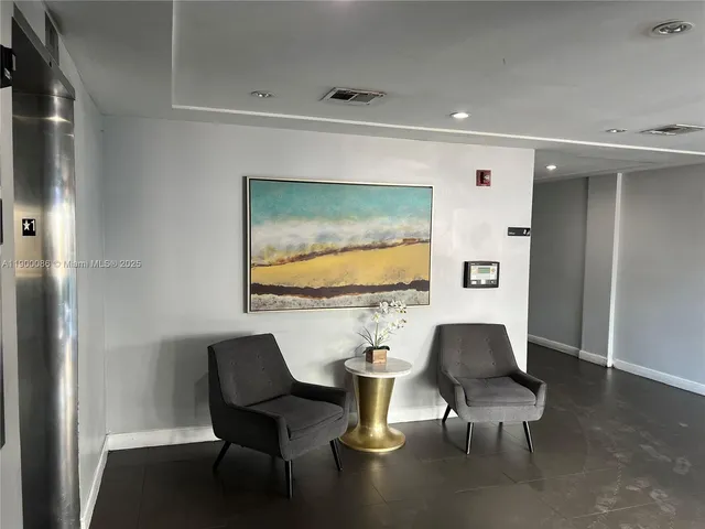 a workspace with furniture and window