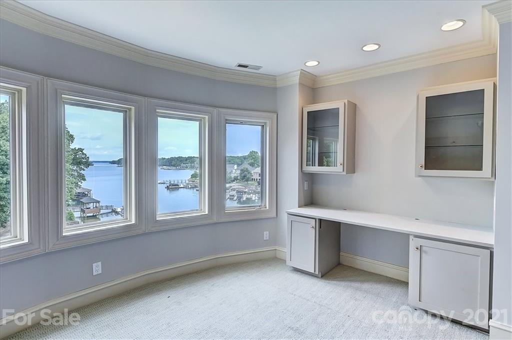 17519 Jetton Road, Unit 390 Cornelius, NC 28031 - Photo 18 of 31 a view of room with window and cabinet