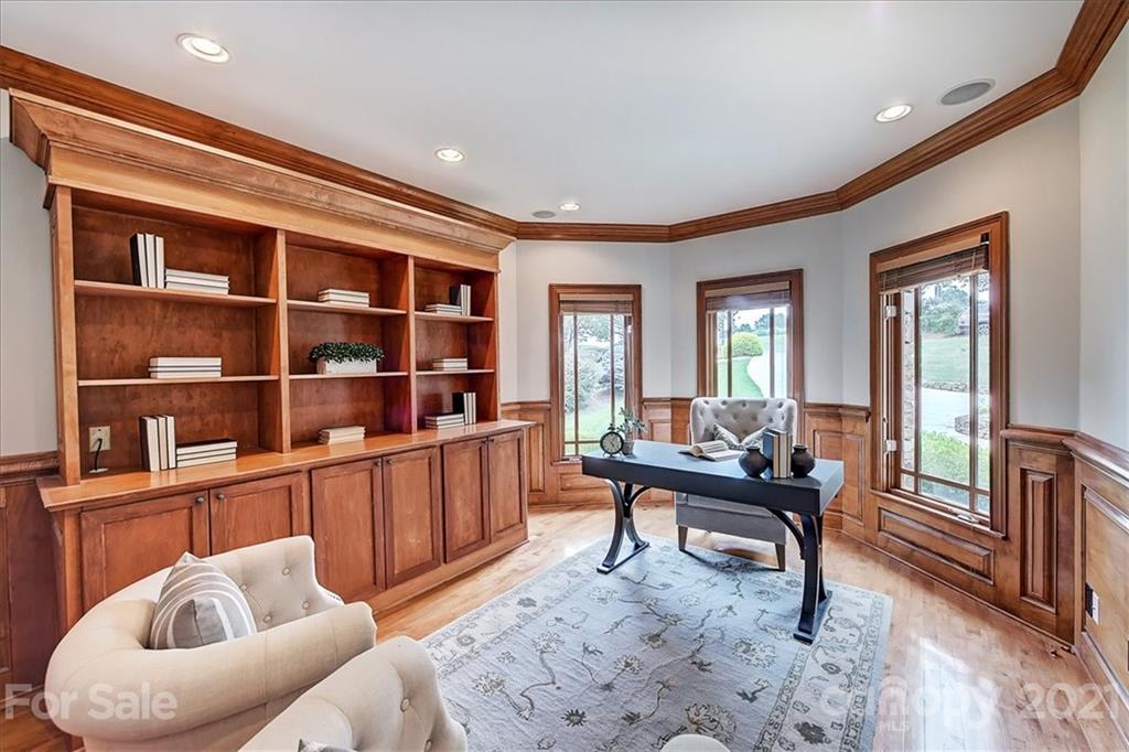 17519 Jetton Road, Unit 390 Cornelius, NC 28031 - Photo 3 of 31 a living room with furniture a rug and a large window