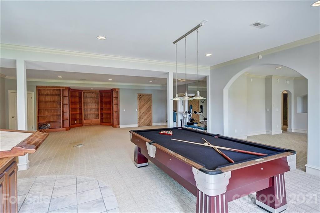 17519 Jetton Road, Unit 390 Cornelius, NC 28031 - Photo 22 of 31 a room with pool table and flat screen tv