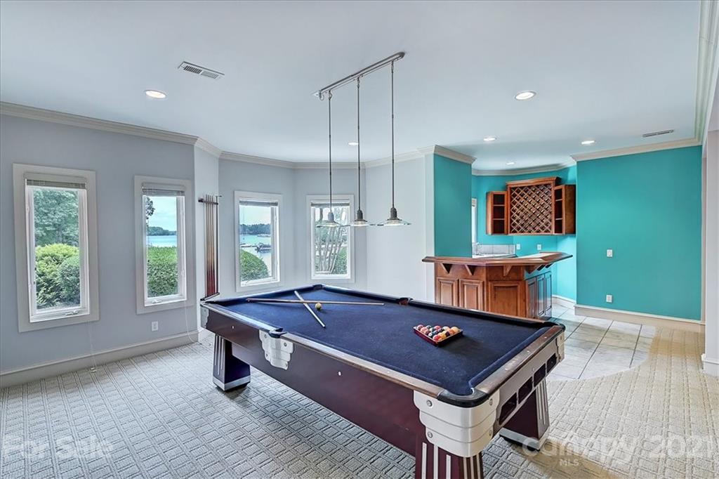 17519 Jetton Road, Unit 390 Cornelius, NC 28031 - Photo 23 of 31 a room with pool table and windows
