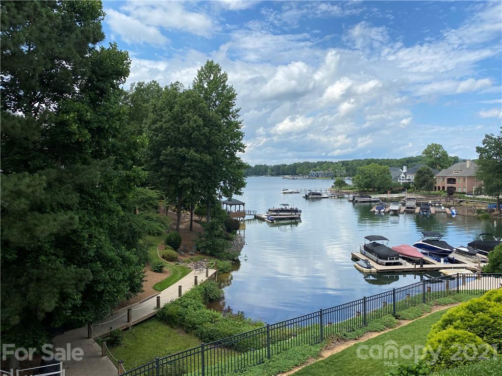 17519 Jetton Road, Unit 390 Cornelius, NC 28031 - Photo 24 of 31 a lake view with a garden