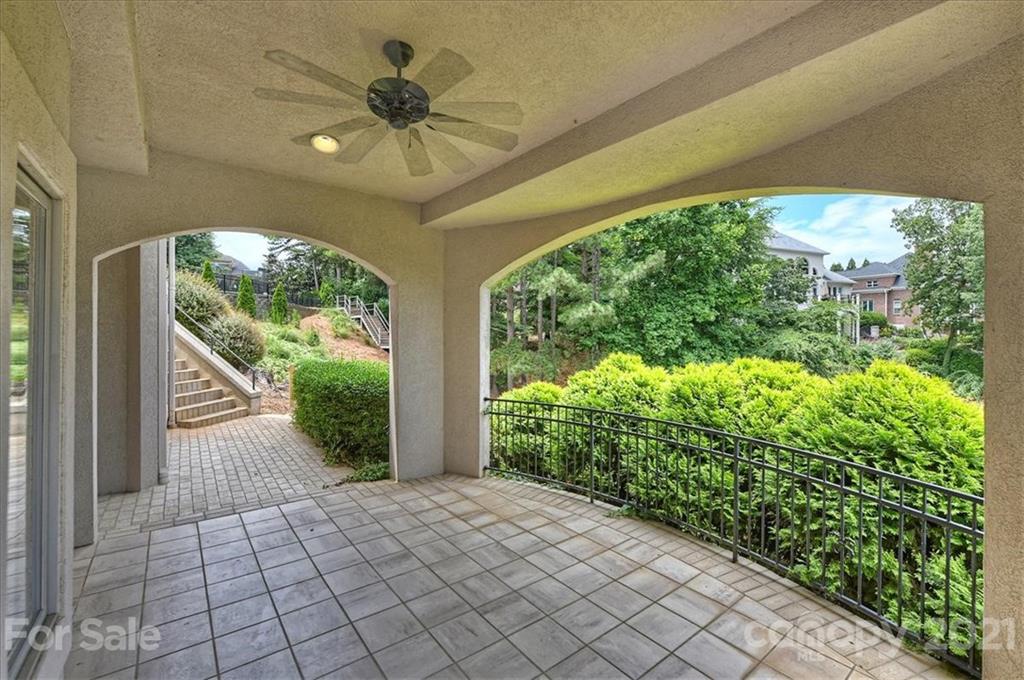 17519 Jetton Road, Unit 390 Cornelius, NC 28031 - Photo 26 of 31 a view of a garden with plants and a large window