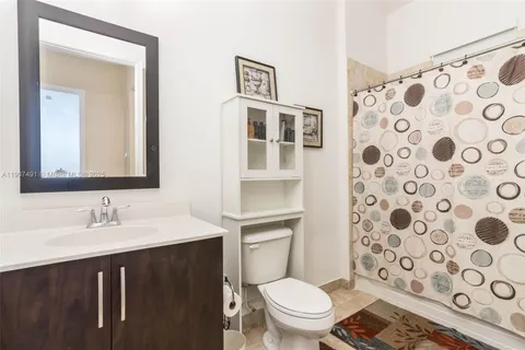 a view of a front door and wooden floor