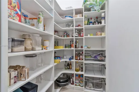 a shelf with books and knick knacks on it