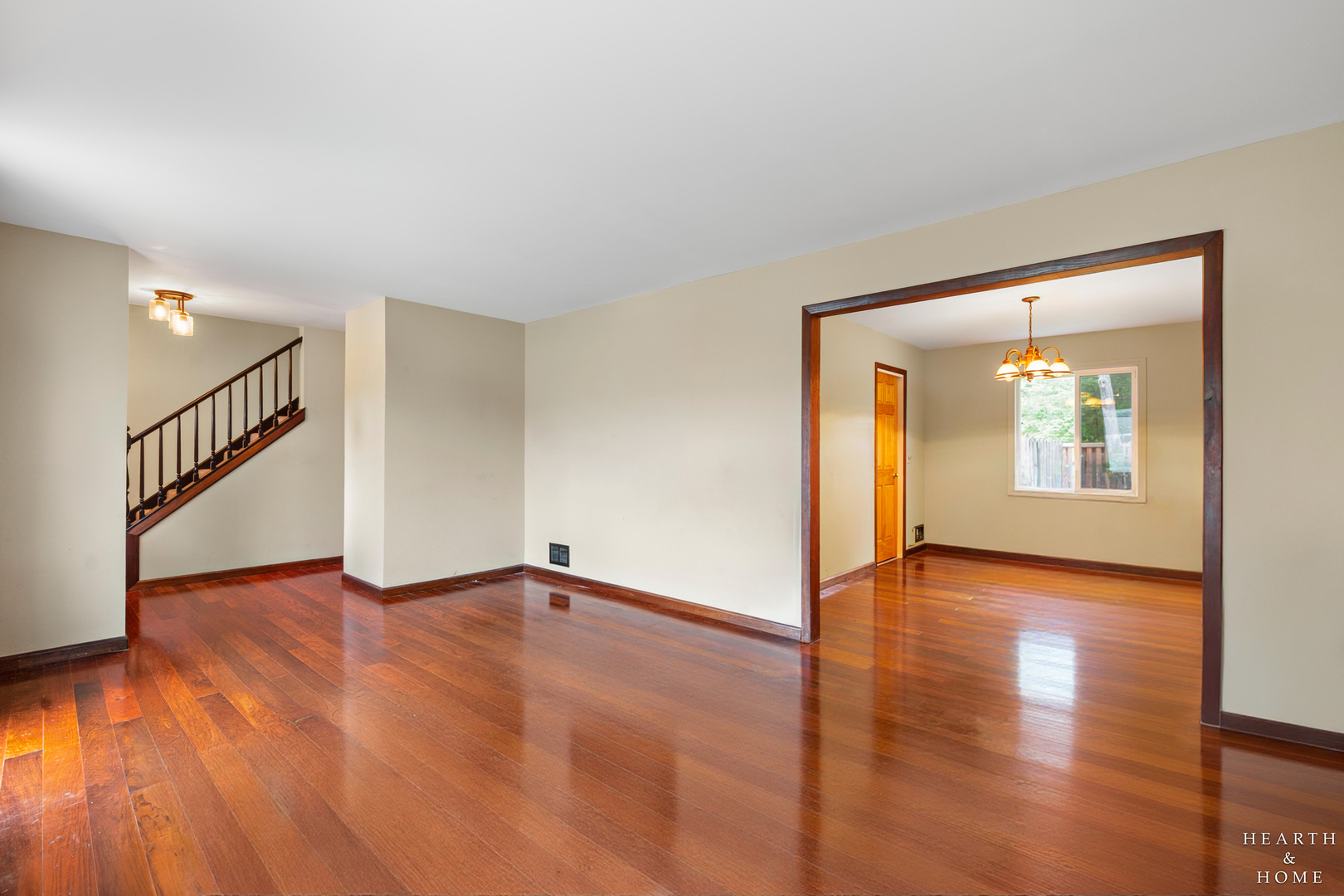506 Old Hunt Road Fox River Grove, IL 60021 - Photo 7 of 44 a view of an empty room with wooden floor and a window