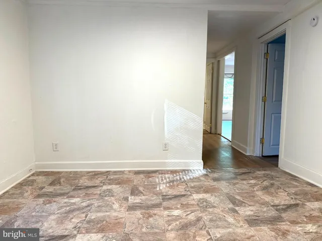 an empty room with a natural light