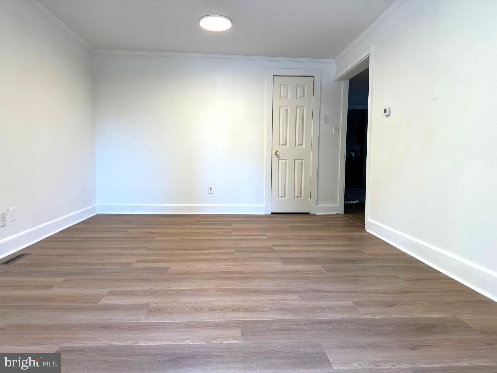 61 West W Pitman, NJ 08071 - Photo 7 of 9 a view of room with wooden floor