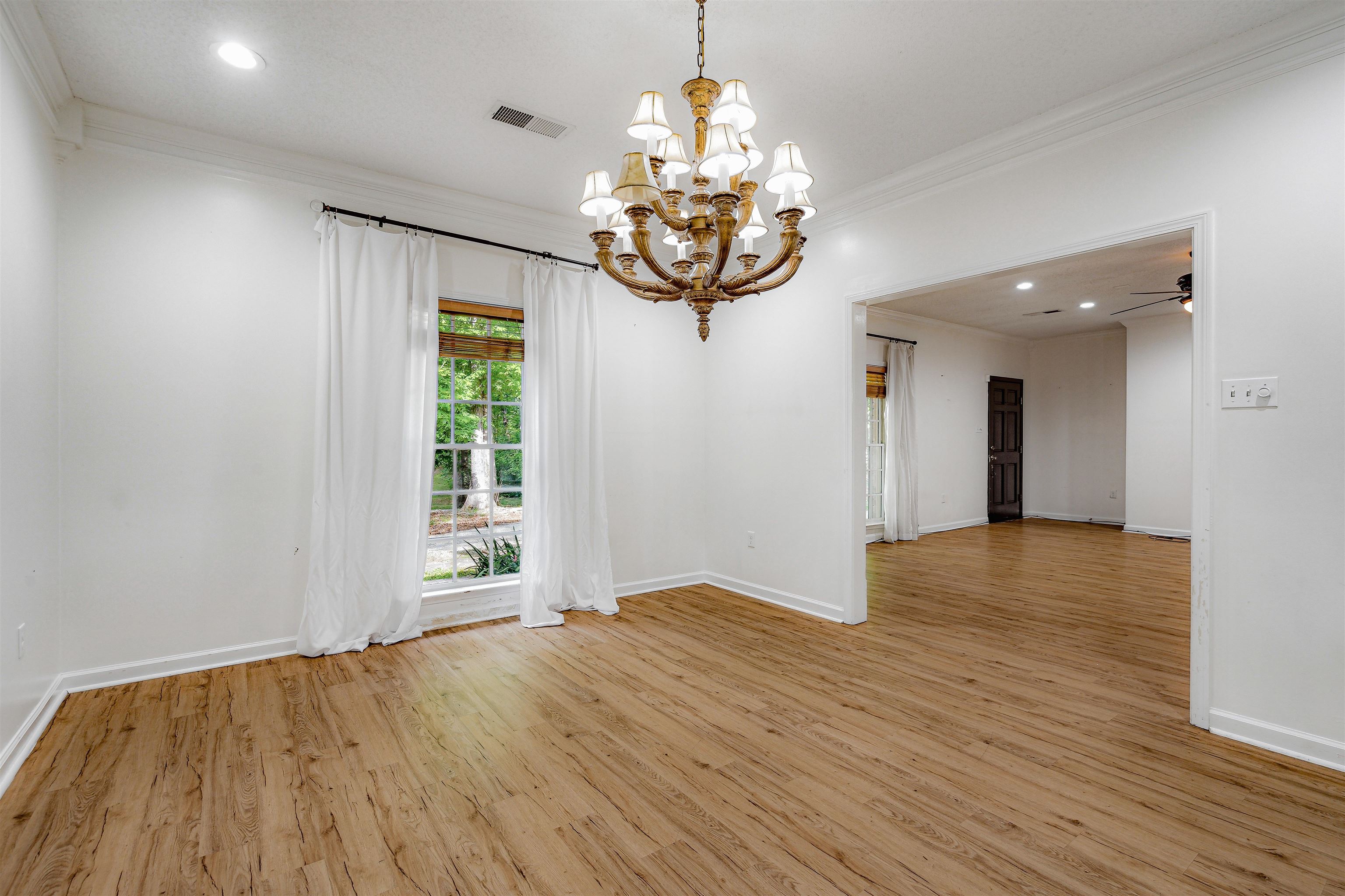 4020 Price Road Moscow, TN 38057 - Photo 18 of 35 Spare room with recessed lighting, baseboards, ornamental molding, and light wood finished floors