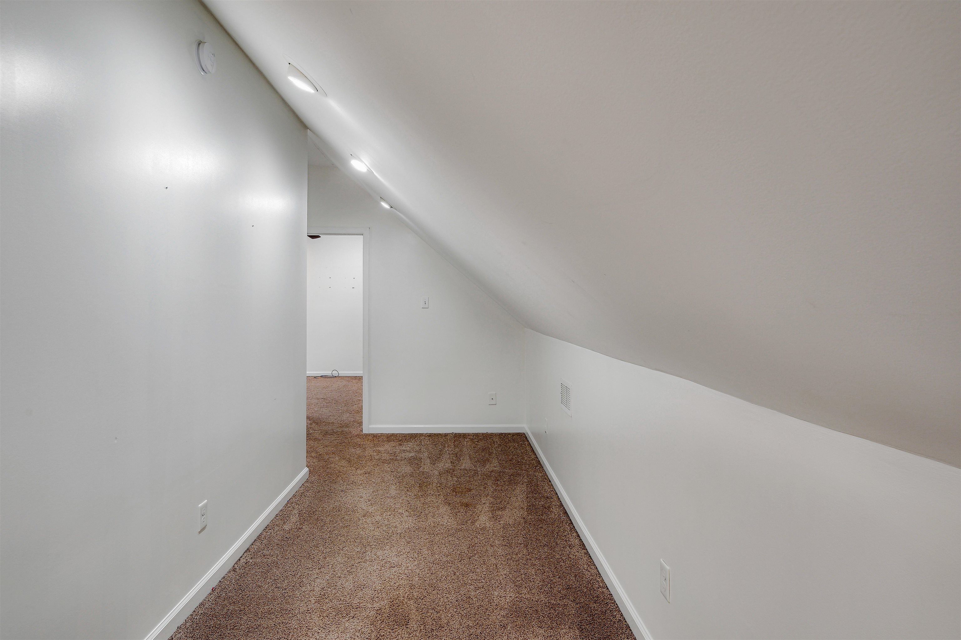 4020 Price Road Moscow, TN 38057 - Photo 28 of 35 Bonus room with baseboards, carpet flooring, and lofted ceiling