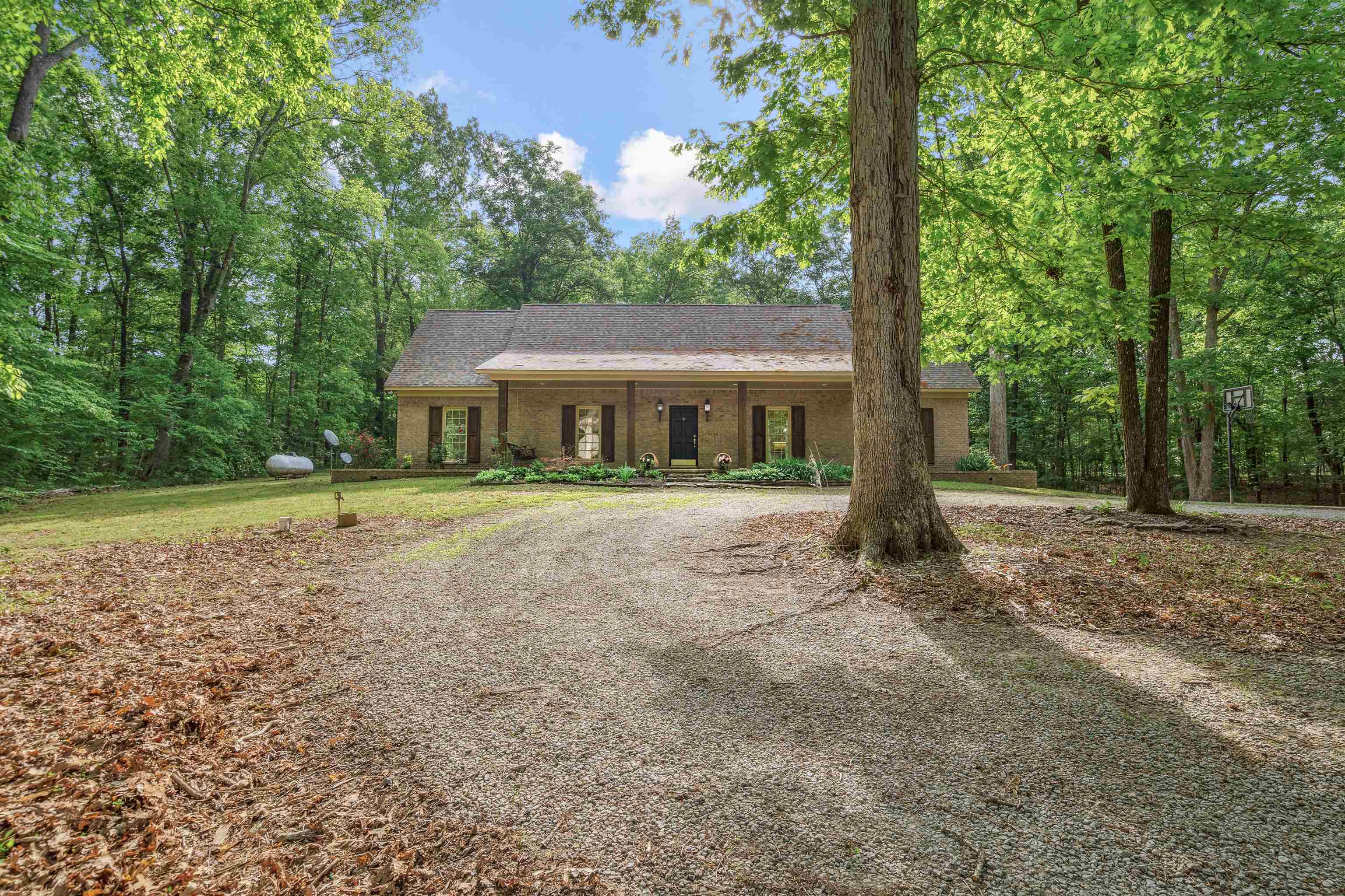 4020 Price Road Moscow, TN 38057 - Photo 3 of 35 View of front of house with brick siding and roof with shingles
