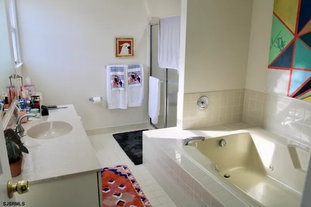 a bathroom with a sink and a bathtub