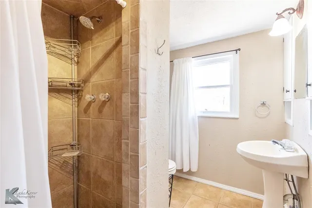 a bathroom with a sink and a toilet