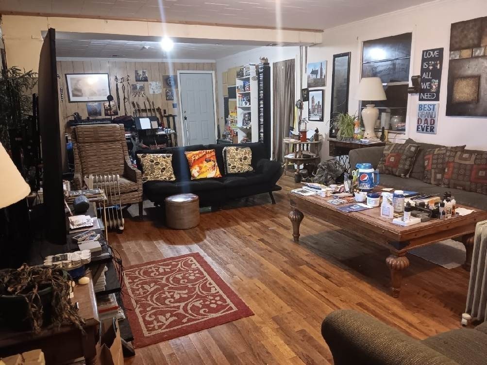 1183 Main Street Altamont, TN 37301 - Photo 13 of 52 a living room with furniture and a table