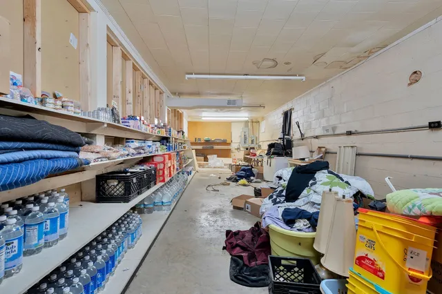 a room with furniture and a wooden floor