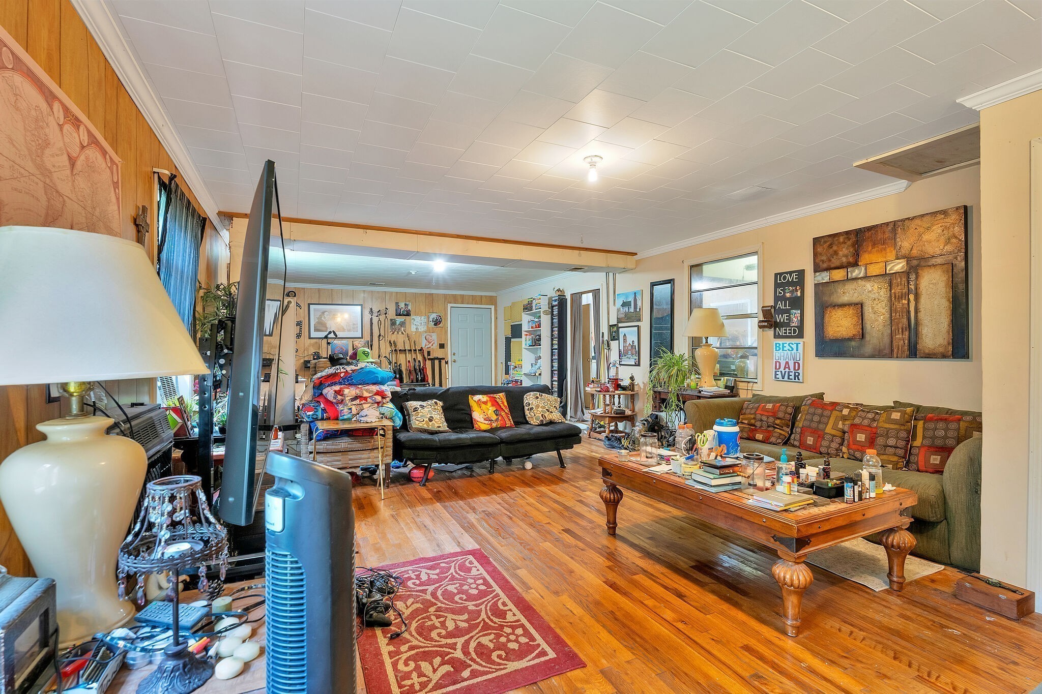 1183 Main Street Altamont, TN 37301 - Photo 41 of 52 a living room with furniture a rug and a floor to ceiling window