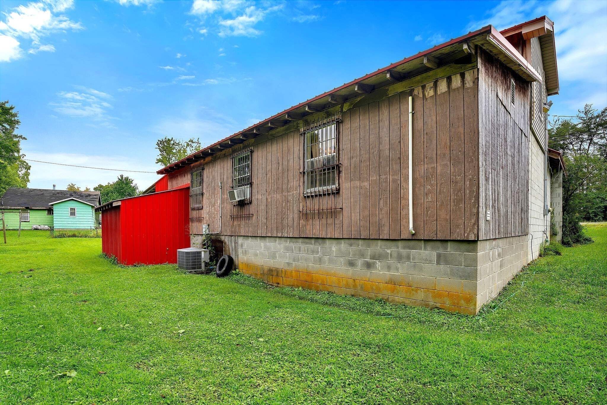 1183 Main Street Altamont, TN 37301 - Photo 46 of 52 a backyard of a house with wooden fence and large trees